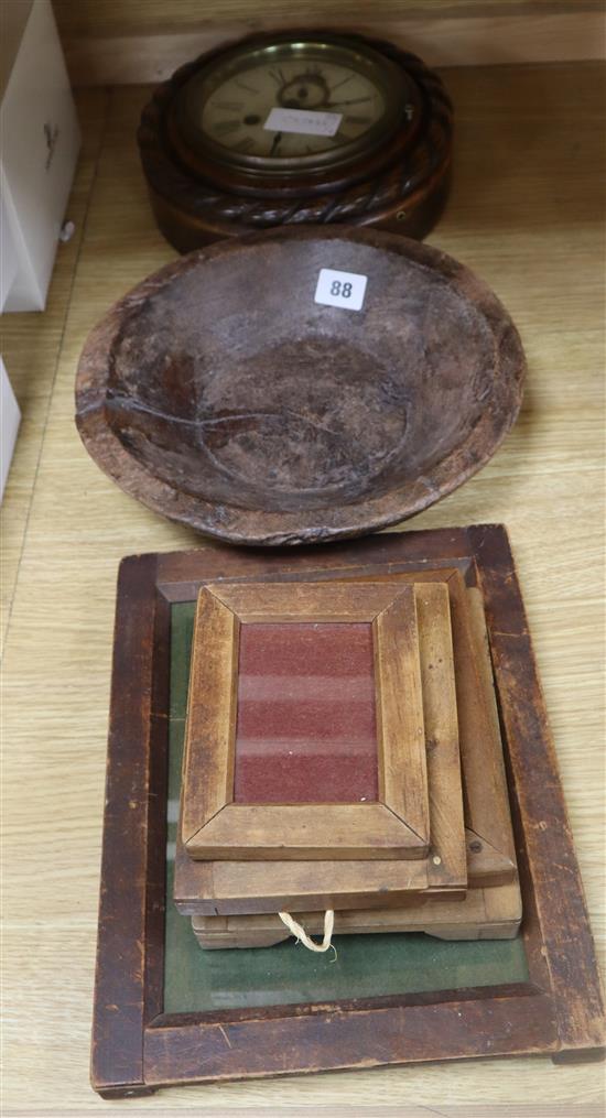 A Victorian eight day wall timepiece in ropetwist oak frame, a small hardwood bowl and wooden slide frames